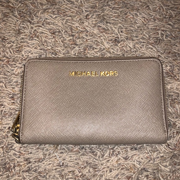 Michael Kors Handbags - SOLD // Michael Kors Medium Sized Tan Wallet